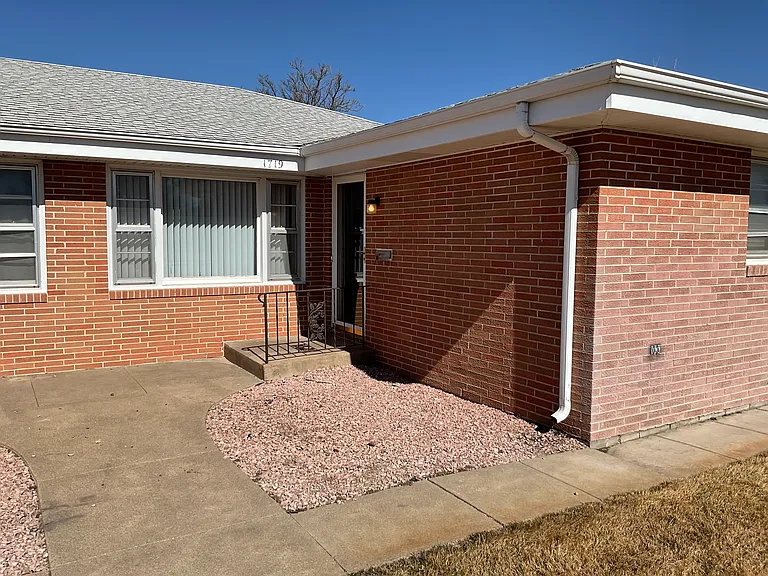 Spacious and well-maintained duplex for lease at 1719 W A Street, North Platte, NE, featuring 3 bedrooms, 1 full bathroom, and 1 half bath.